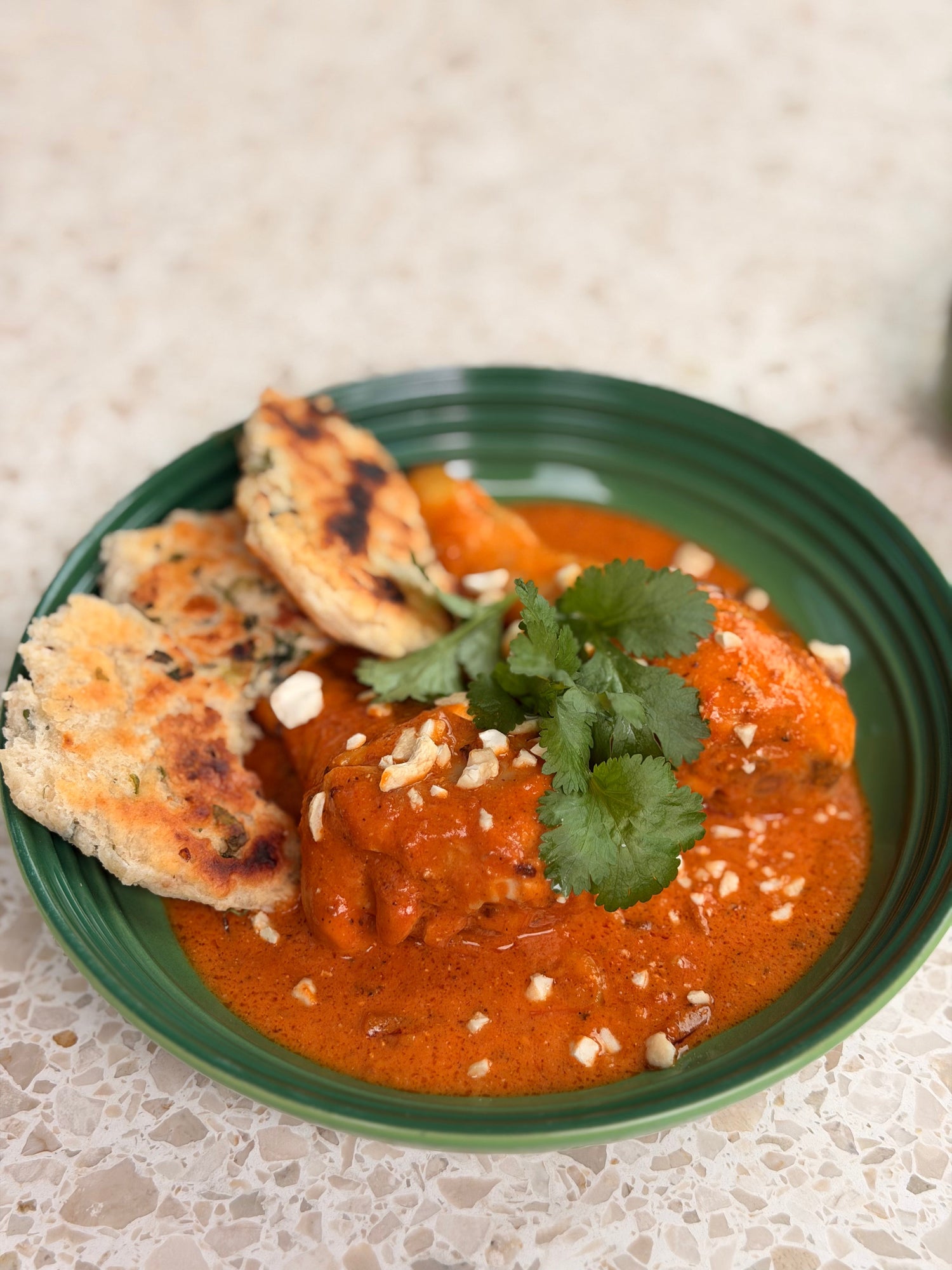 butter chicken met think tomato